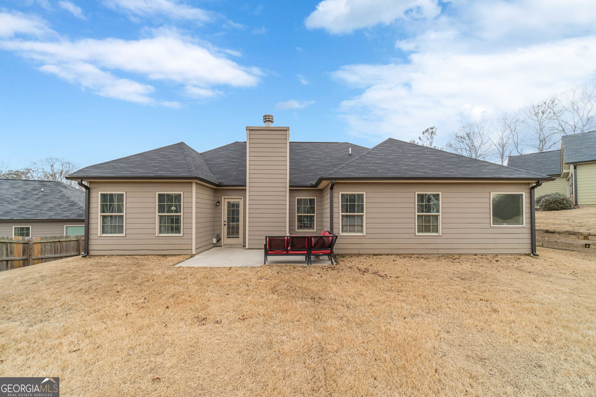 149 Peak Court Winder, GA 30680 - Photo 25 of 27 a front view of a house with a yard and garage