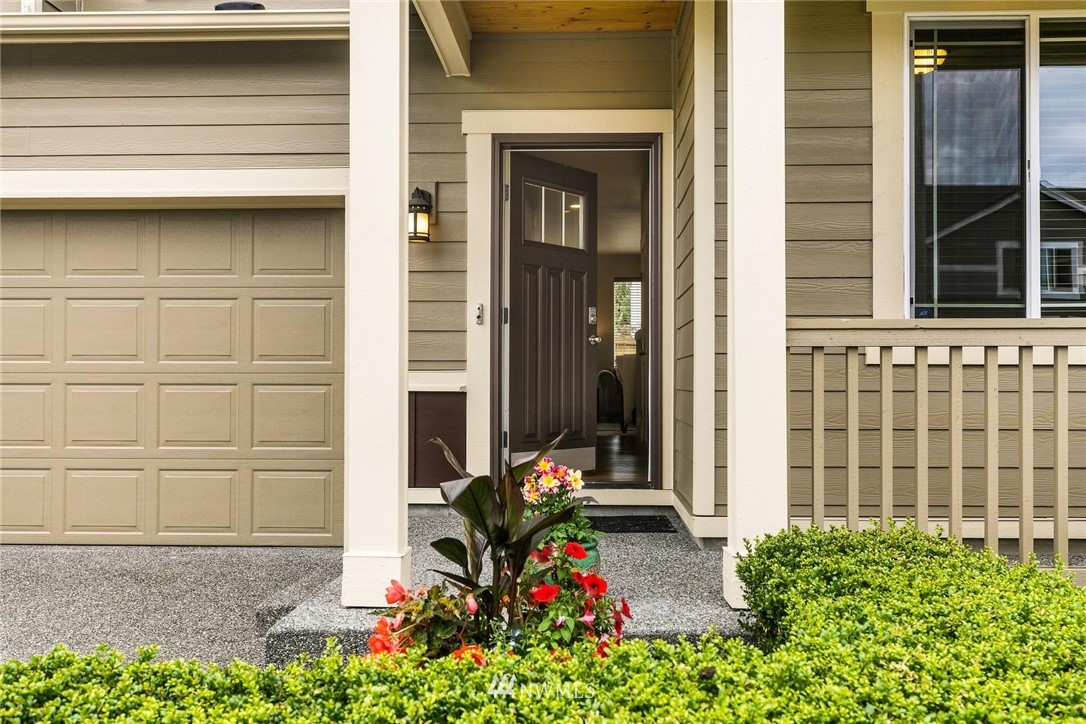 3731 226th Street Southeast Bothell, WA 98021 - Photo 3 of 30 a front view of a house with a yard
