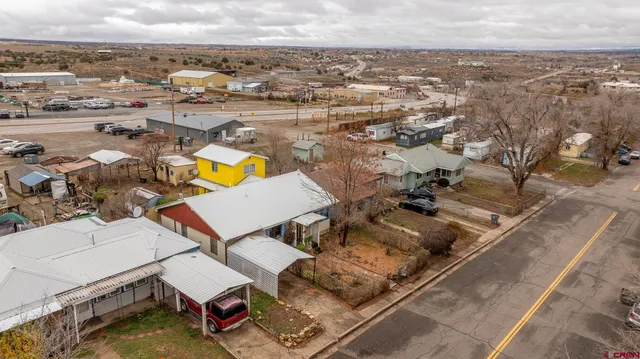 a view of a back yard of the house
