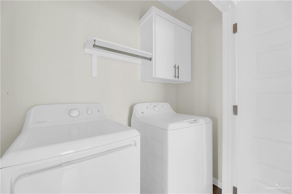 409 Rafael Drive San Juan, TX 78589 - Photo 14 of 20 a utility room with dryer and washer