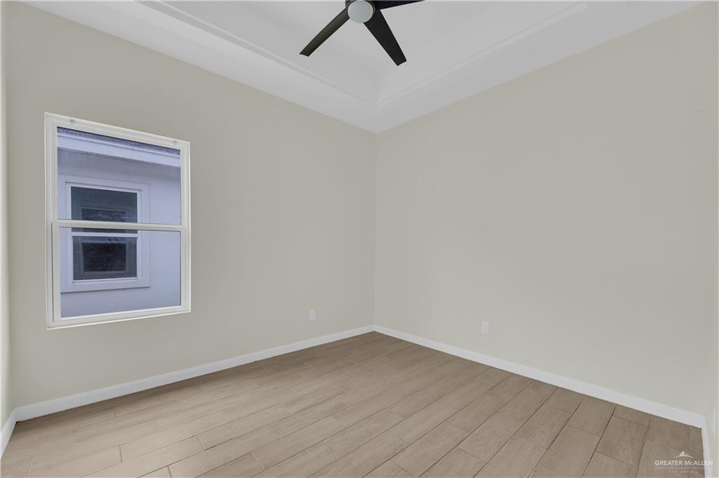 409 Rafael Drive San Juan, TX 78589 - Photo 15 of 20 a view of an empty room with a window