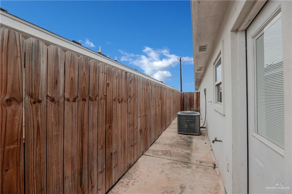 409 Rafael Drive San Juan, TX 78589 - Photo 19 of 20 a view of a balcony with wooden fence