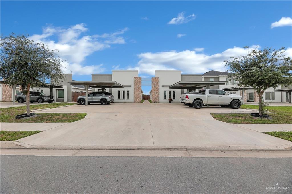 409 Rafael Drive San Juan, TX 78589 - Photo 2 of 20 a view of street with parked cars