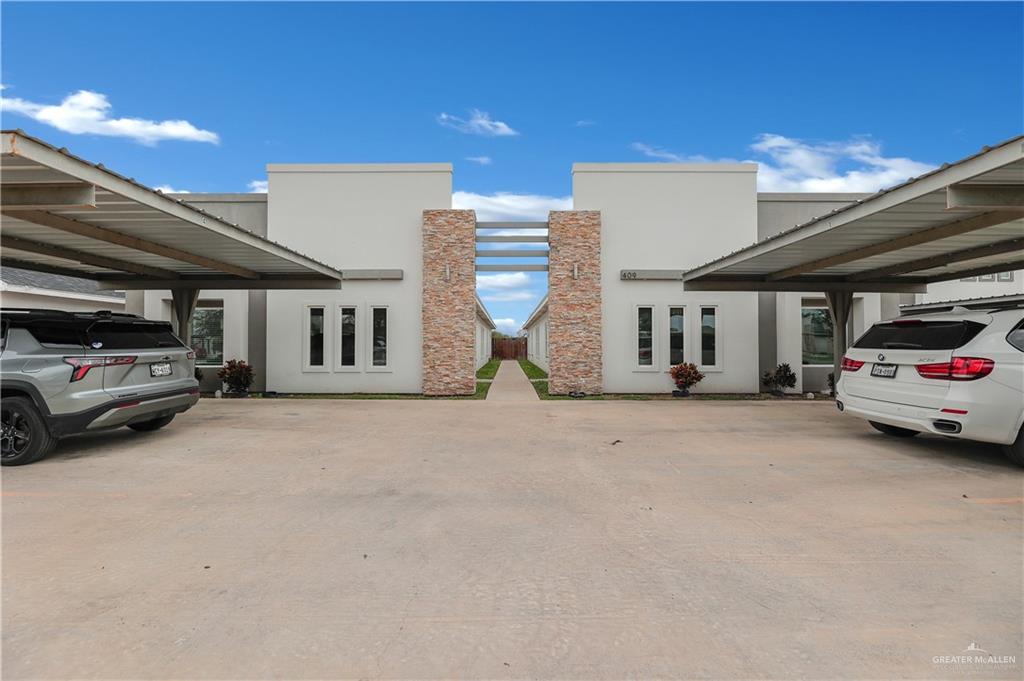 409 Rafael Drive San Juan, TX 78589 - Photo 4 of 20 a view of car parking