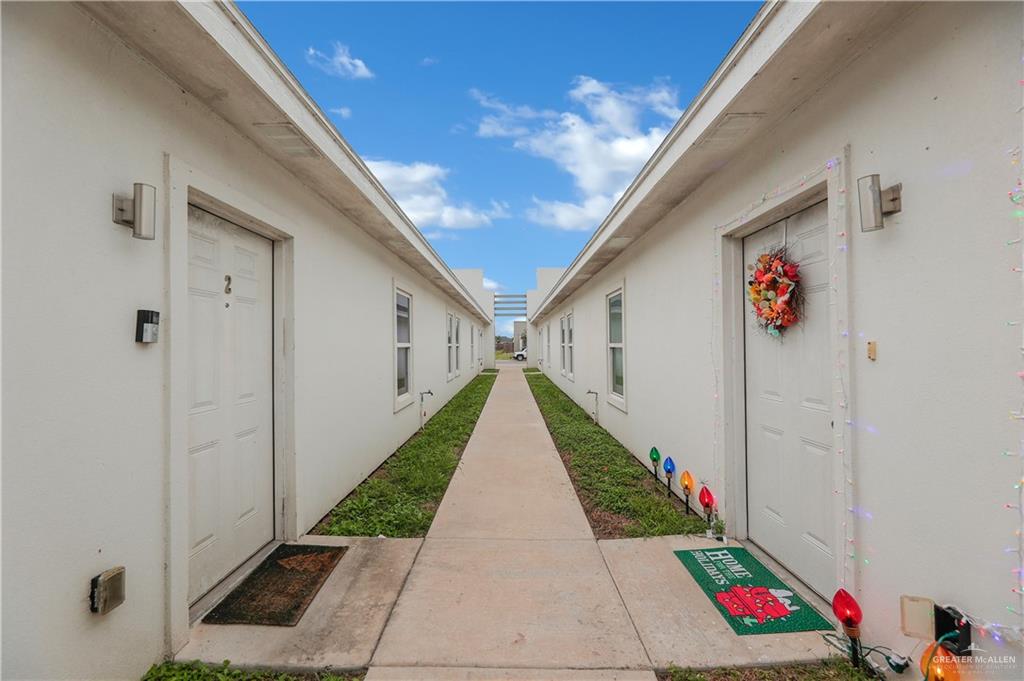 409 Rafael Drive San Juan, TX 78589 - Photo 6 of 20 a view of stairs and flowers with bathtub in wooden floor