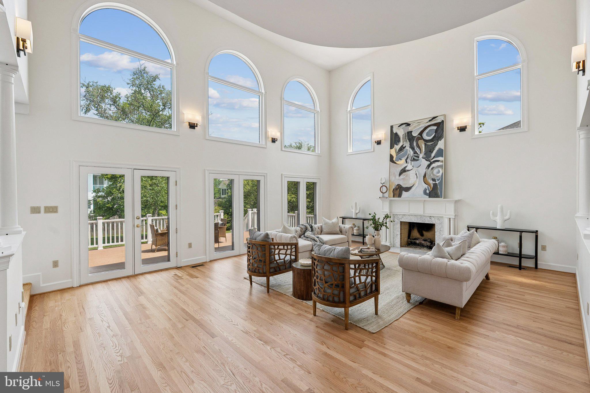 9309 Bells Mill Road Potomac, MD 20854 - Photo 13 of 38 a living room with furniture and a fireplace