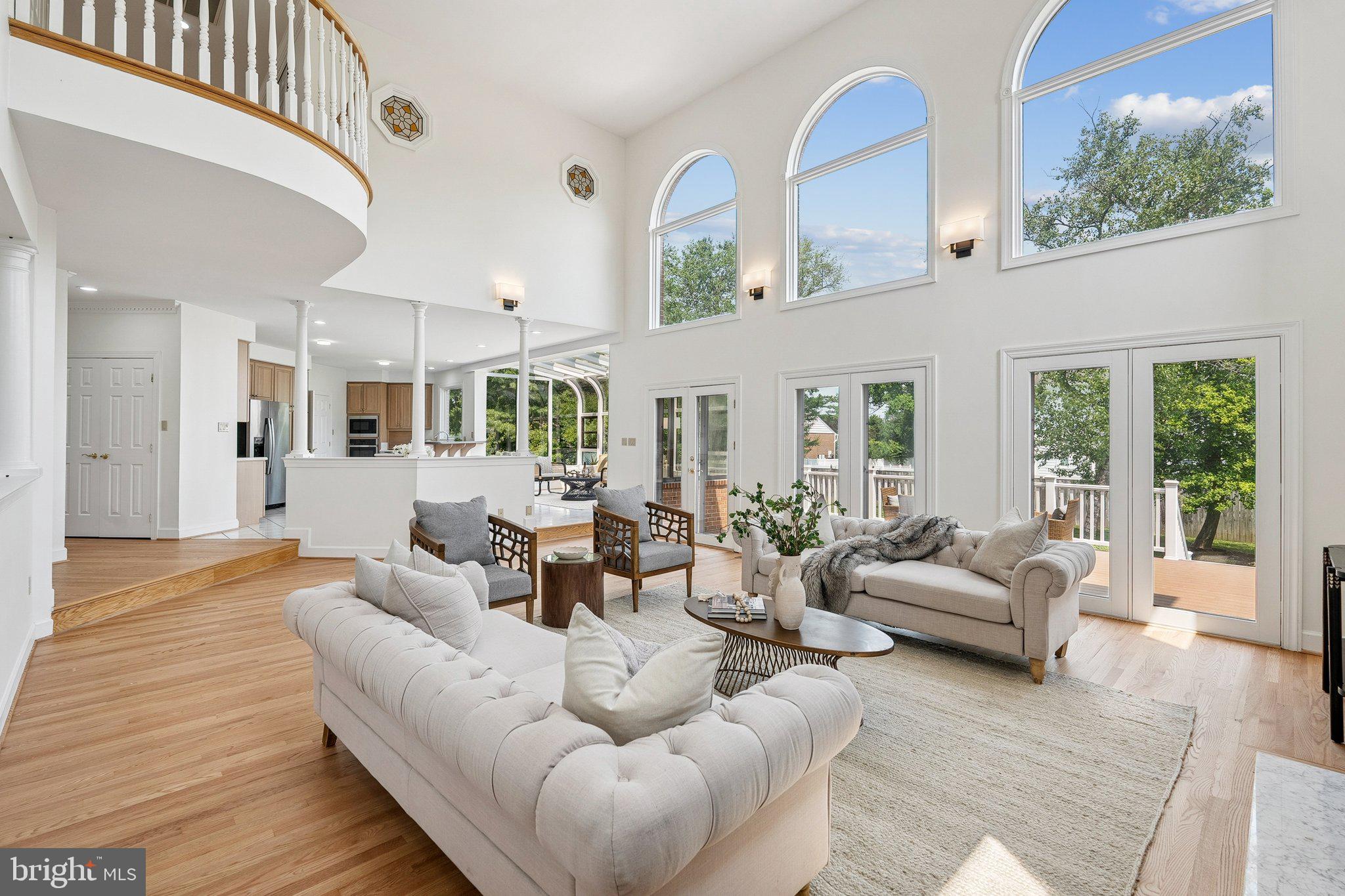 9309 Bells Mill Road Potomac, MD 20854 - Photo 14 of 38 a living room with furniture and a large window
