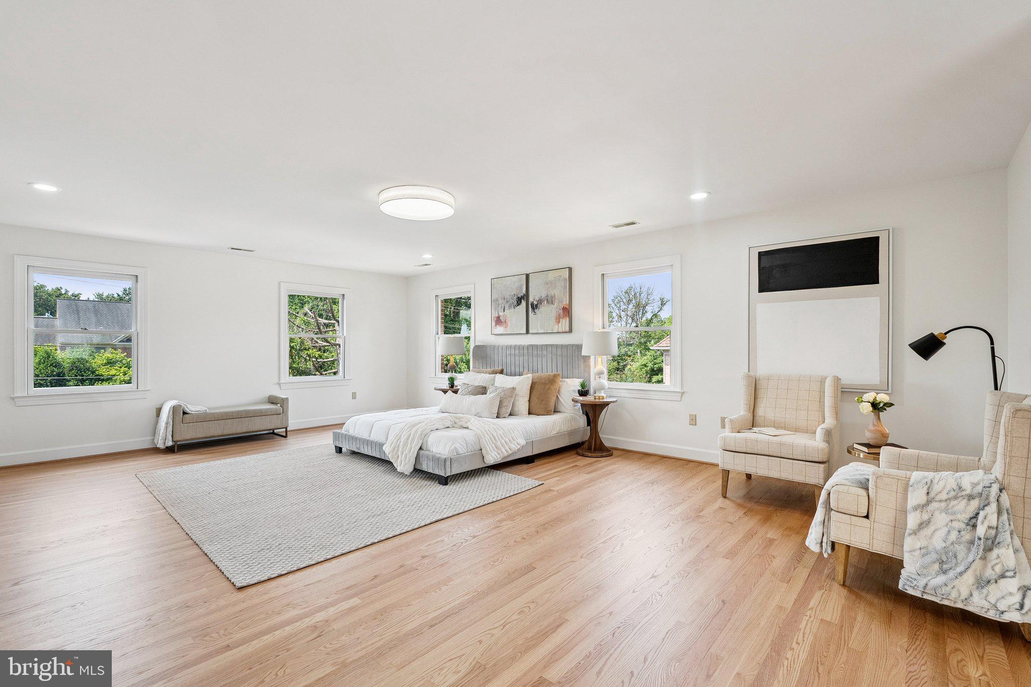 9309 Bells Mill Road Potomac, MD 20854 - Photo 20 of 38 a living room with furniture and wooden floor