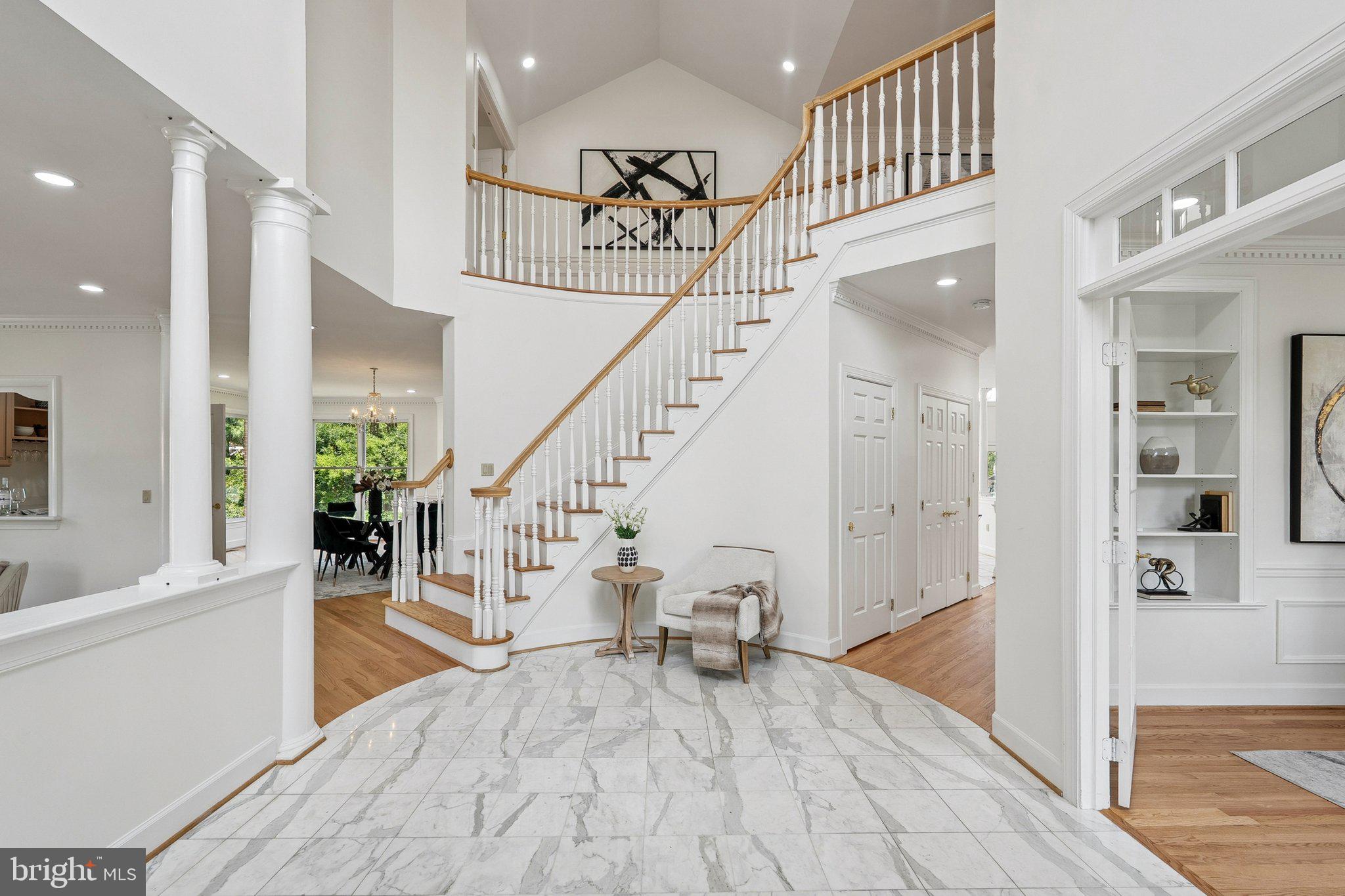 9309 Bells Mill Road Potomac, MD 20854 - Photo 2 of 38 a view of entryway and hall with wooden floor