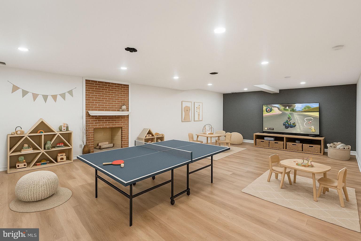 9309 Bells Mill Road Potomac, MD 20854 - Photo 30 of 38 a living room with furniture a table and a flat screen tv