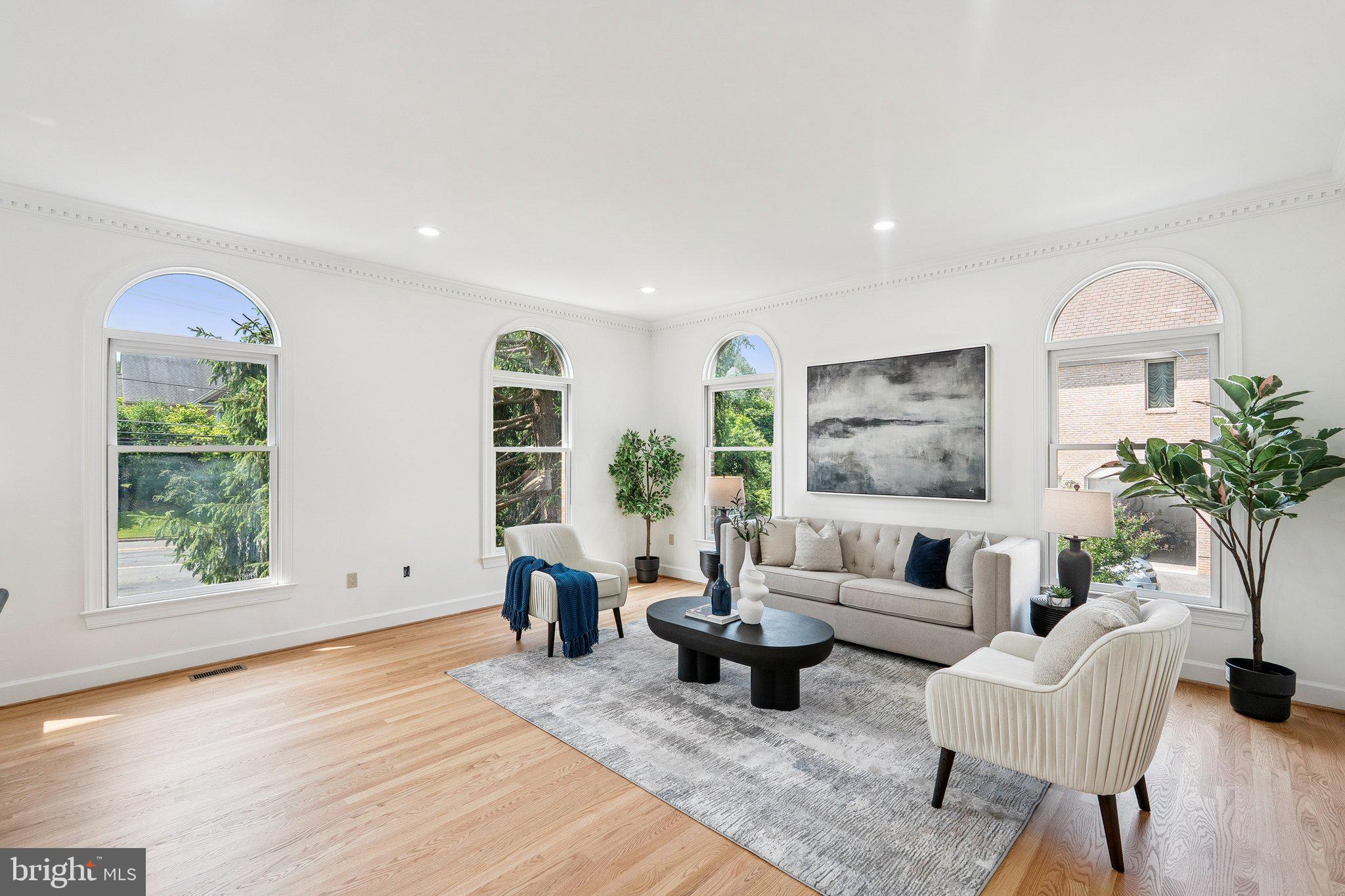 9309 Bells Mill Road Potomac, MD 20854 - Photo 4 of 38 a living room with furniture and a window