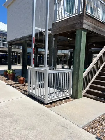 a view of a porch with wooden floor