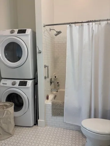 a bathroom with a sink a toilet a mirror and vanity