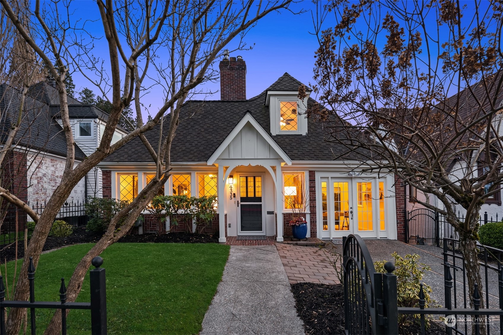 4335 Northeast 45th Street Seattle, WA 98105 - Photo 1 of 37 a front view of a house with a porch