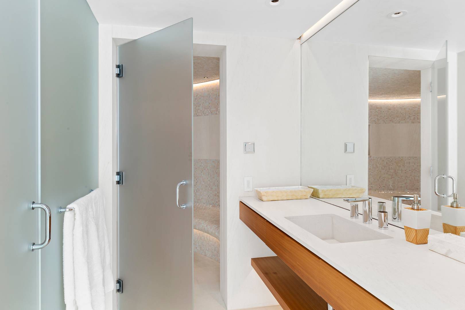 Undisclosed Address Southampton, NY 11968 - Photo 19 of 43 a bathroom with a sink and a mirror