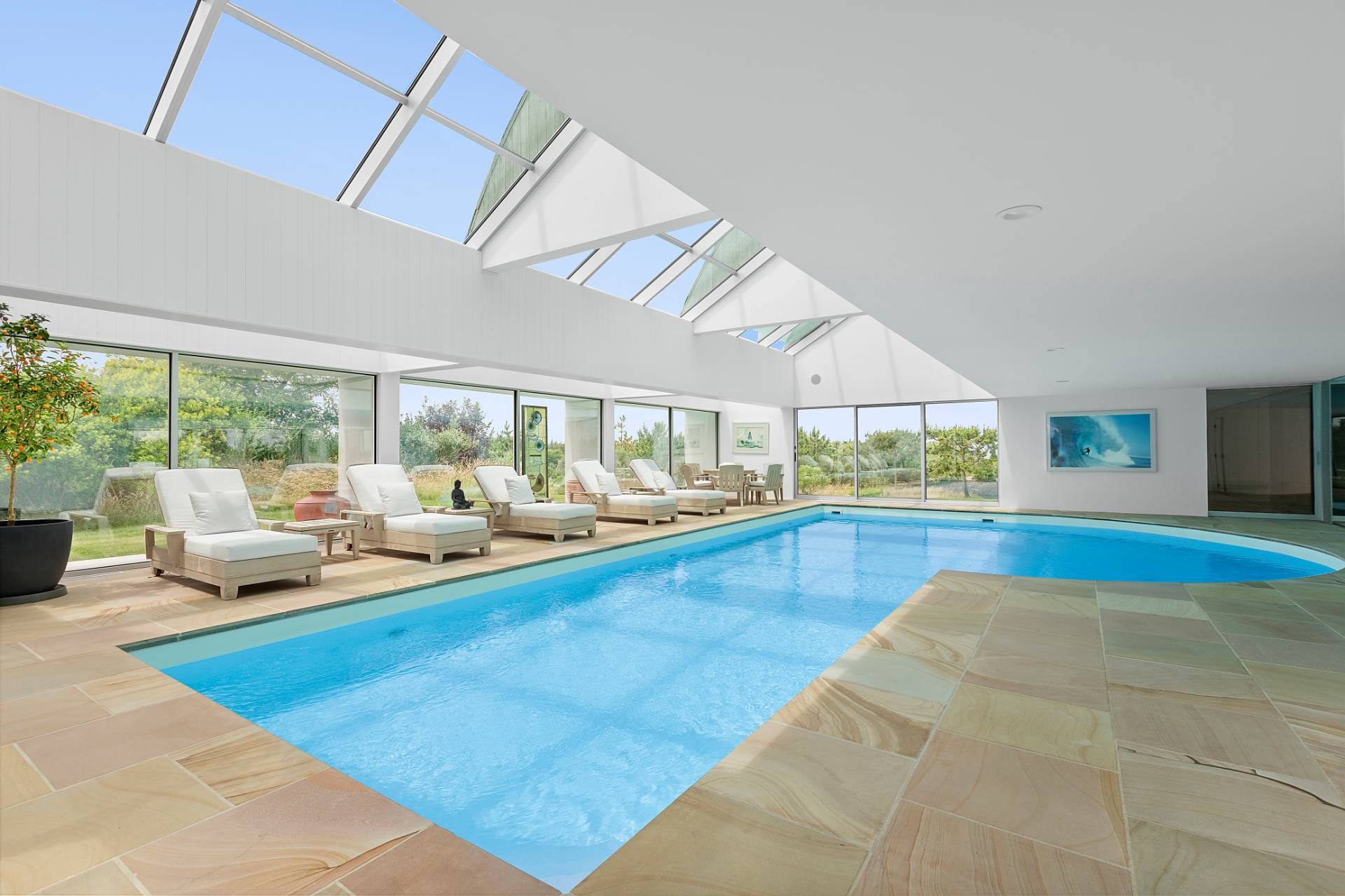 Undisclosed Address Southampton, NY 11968 - Photo 21 of 43 a swimming pool with outdoor seating and yard