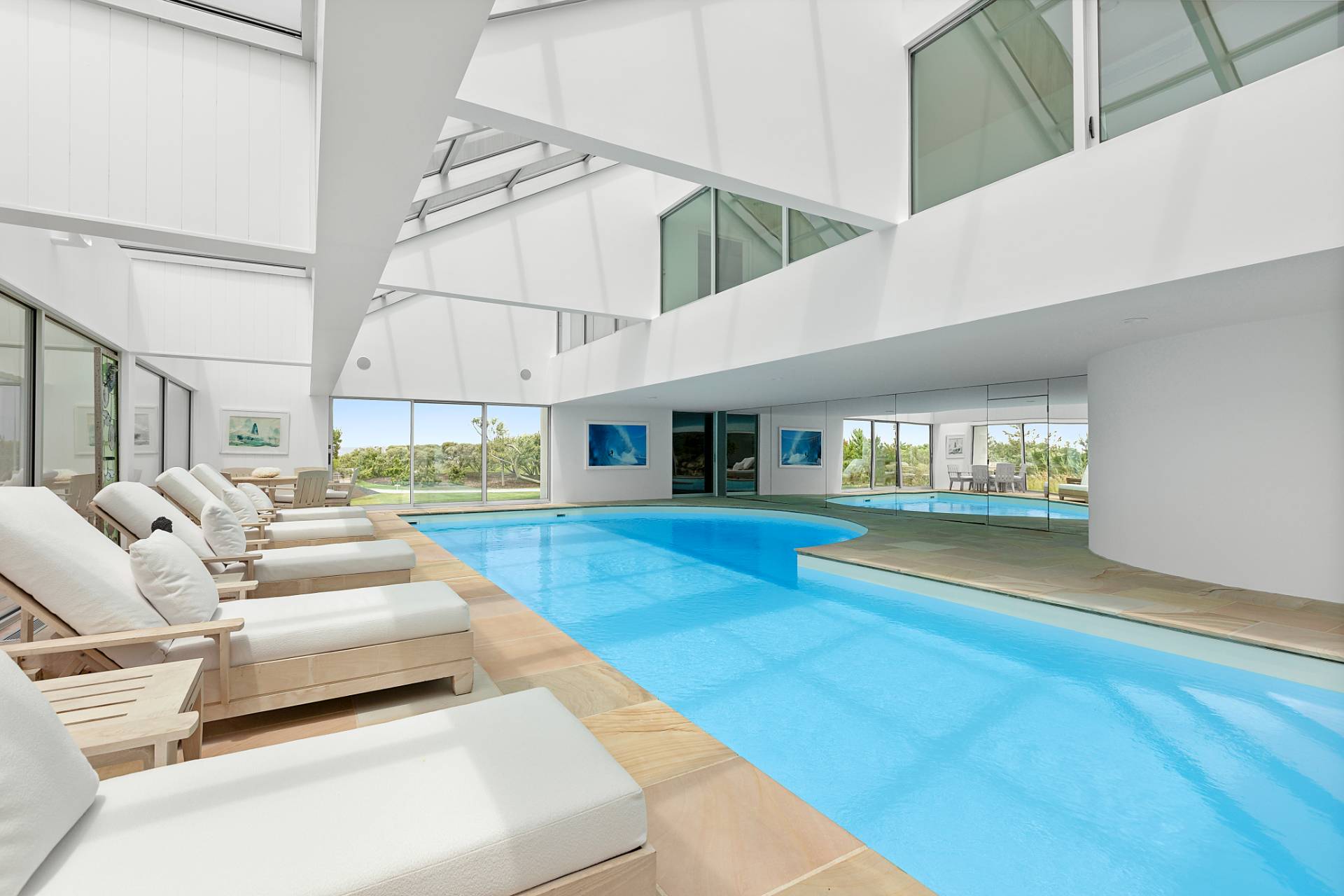 Undisclosed Address Southampton, NY 11968 - Photo 22 of 43 a living room with furniture and a flat screen tv