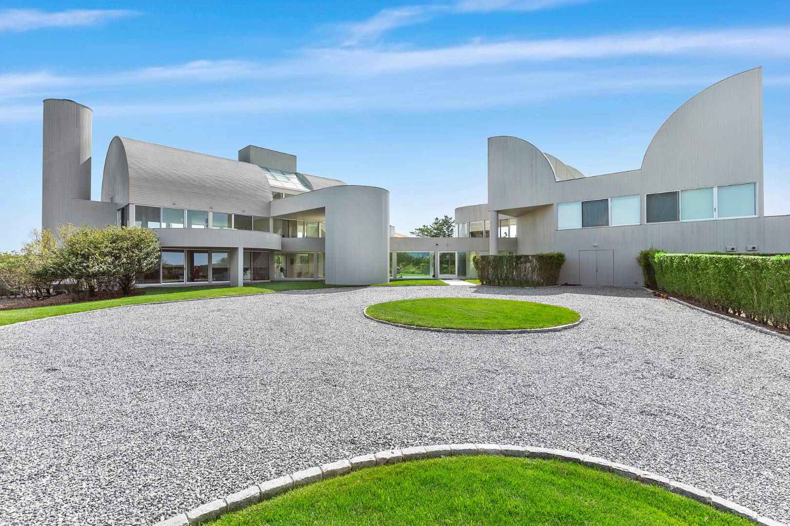 Undisclosed Address Southampton, NY 11968 - Photo 4 of 43 a view of a house with a backyard