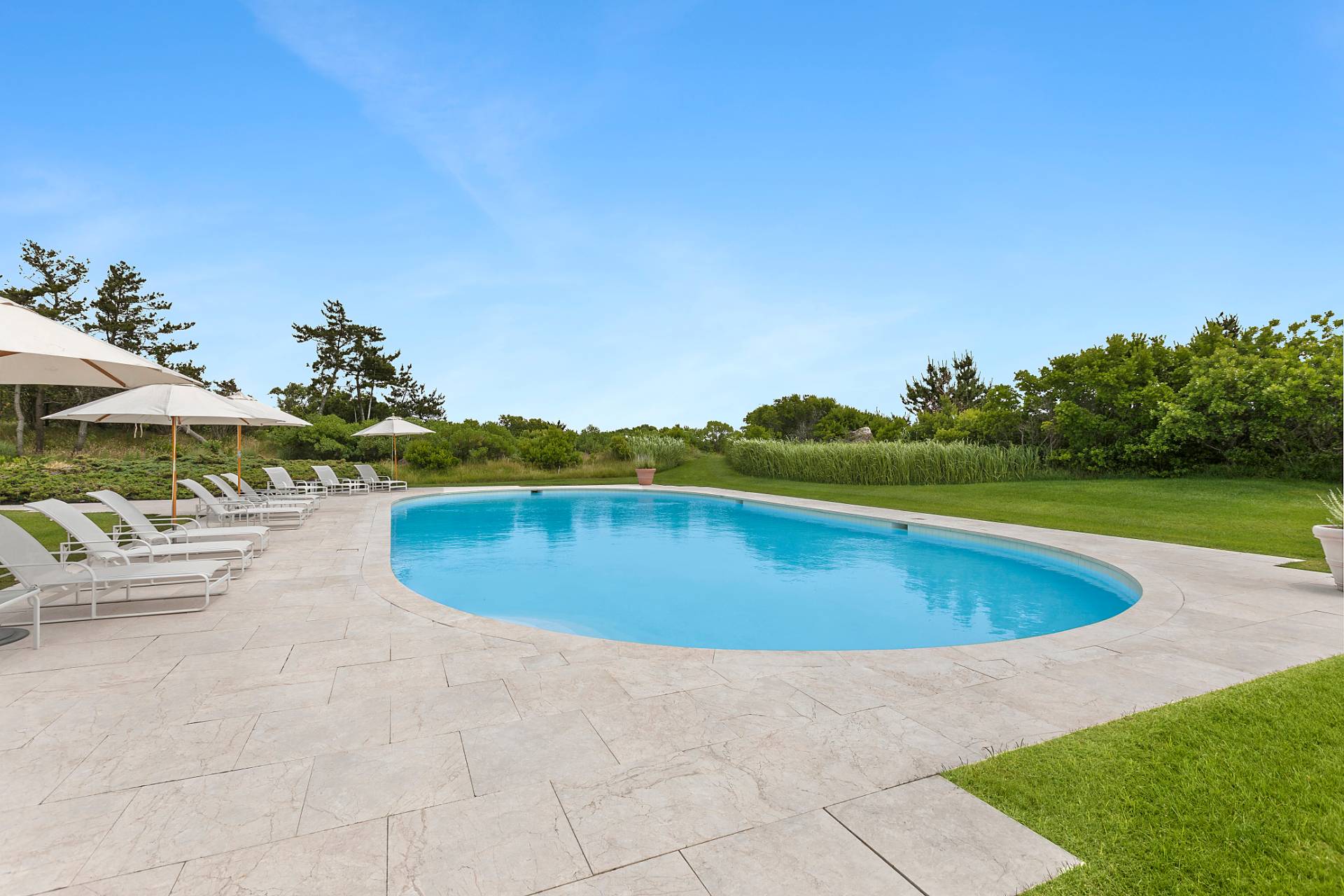 Undisclosed Address Southampton, NY 11968 - Photo 36 of 43 a view of a swimming pool and outdoor space