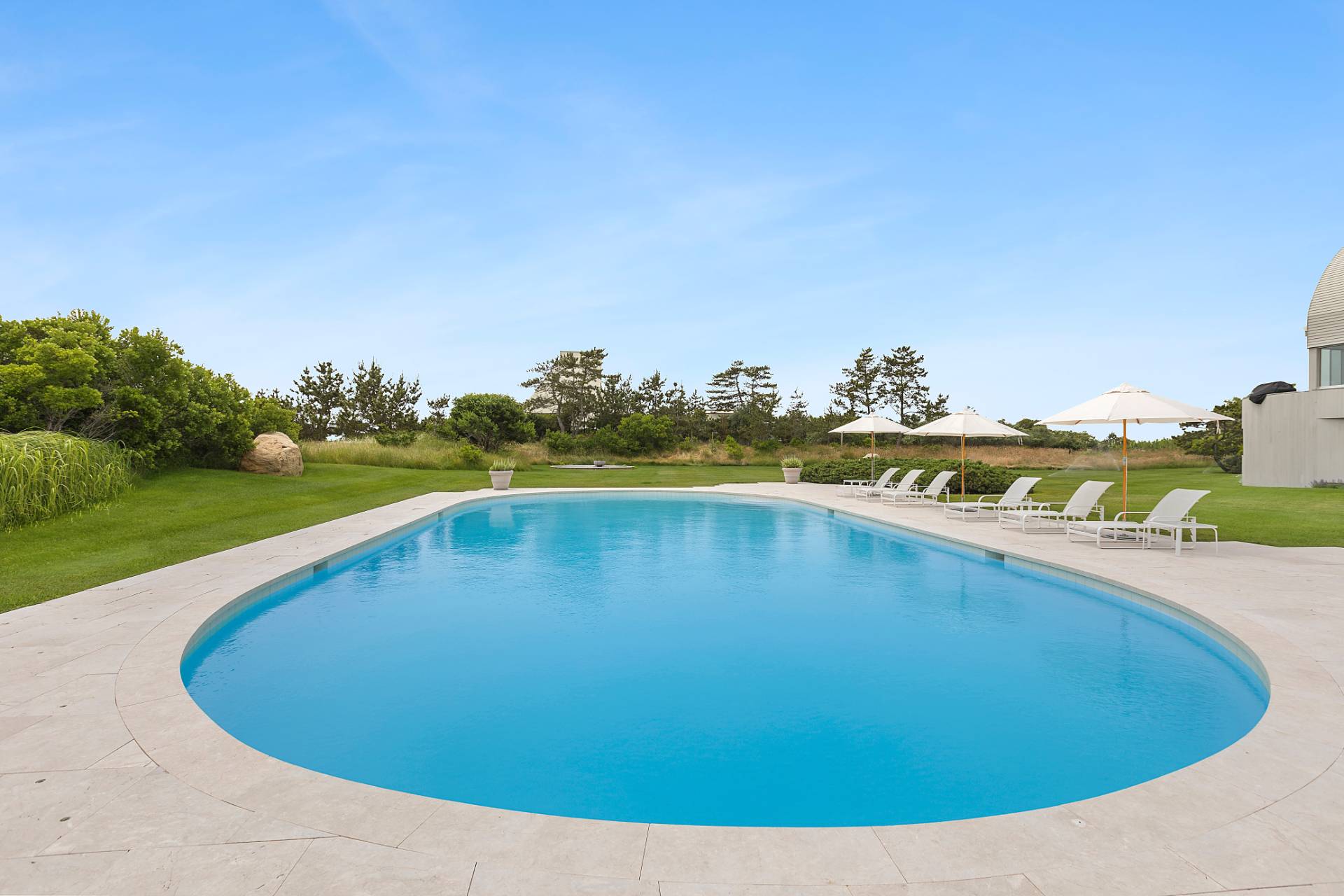 Undisclosed Address Southampton, NY 11968 - Photo 38 of 43 a view of a swimming pool and an outdoor space