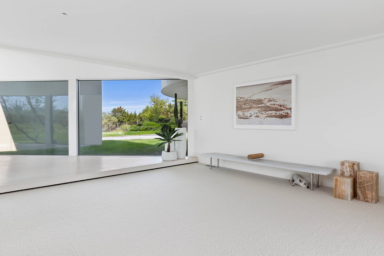 Undisclosed Address Southampton, NY 11968 - Photo 6 of 43 a view of an empty room with a window