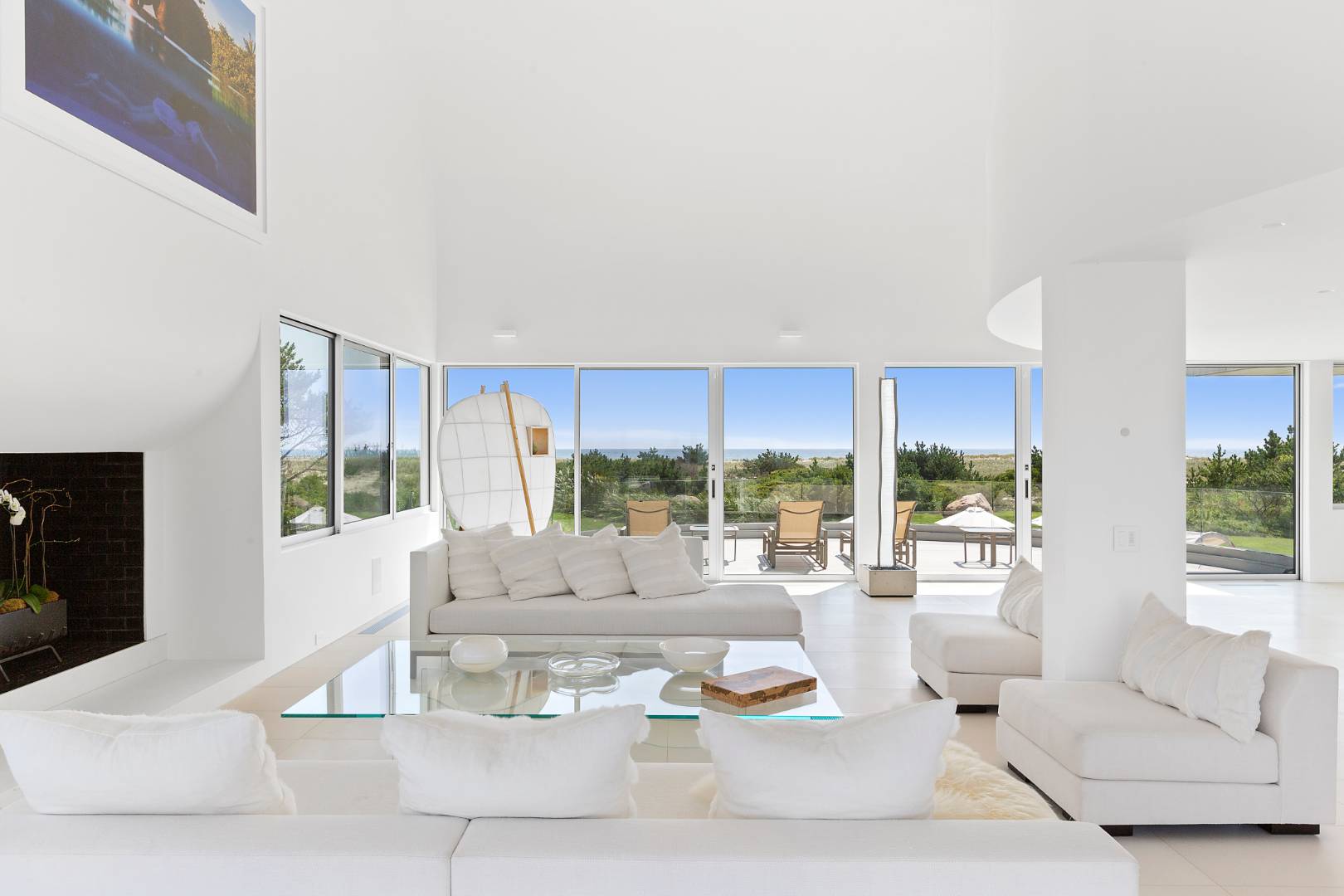 Undisclosed Address Southampton, NY 11968 - Photo 7 of 43 a living room with furniture and a large window