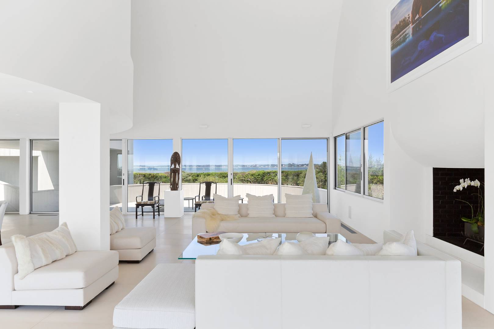 Undisclosed Address Southampton, NY 11968 - Photo 8 of 43 a living room with furniture and a large window