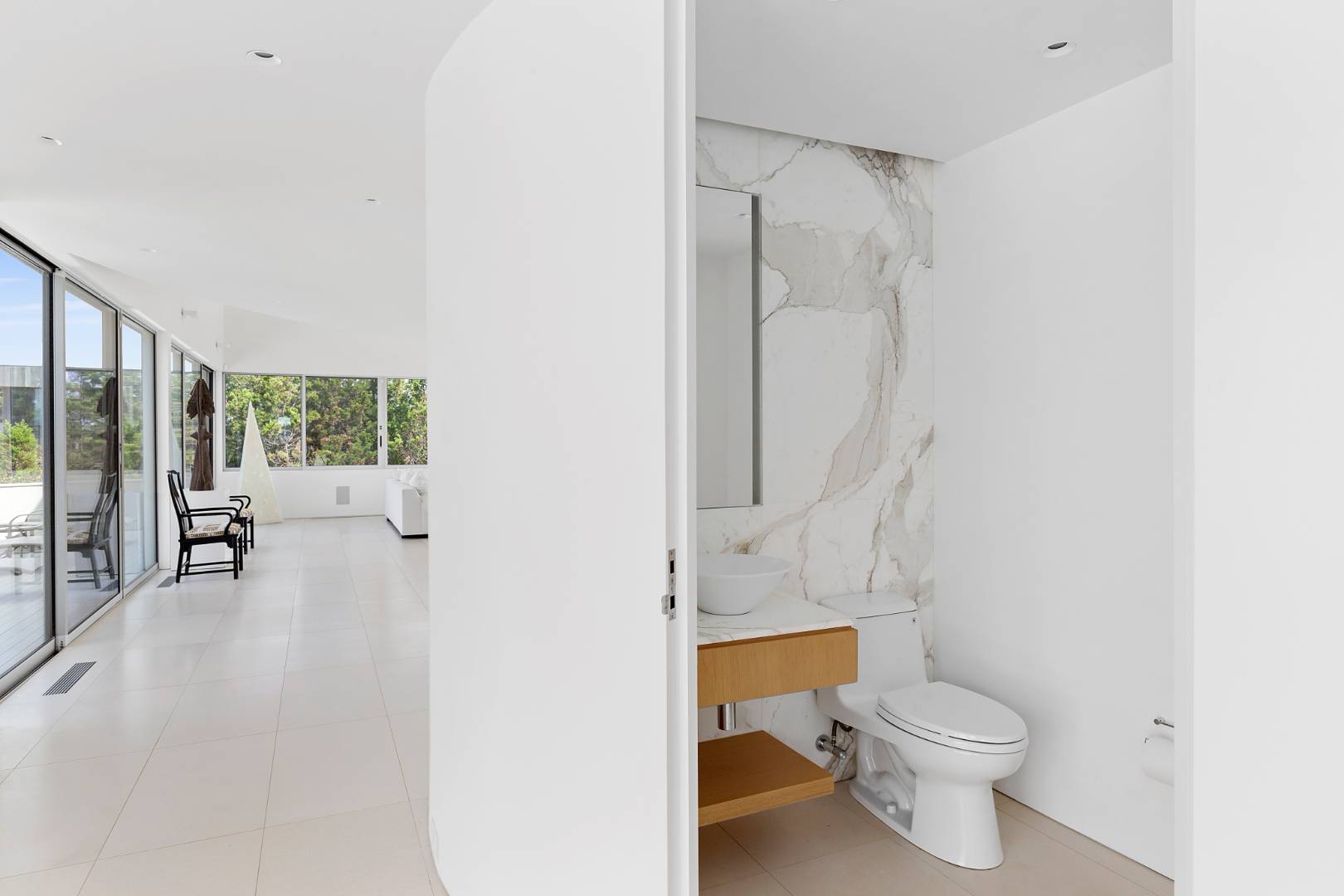 Undisclosed Address Southampton, NY 11968 - Photo 10 of 43 a bathroom with a toilet and a shower