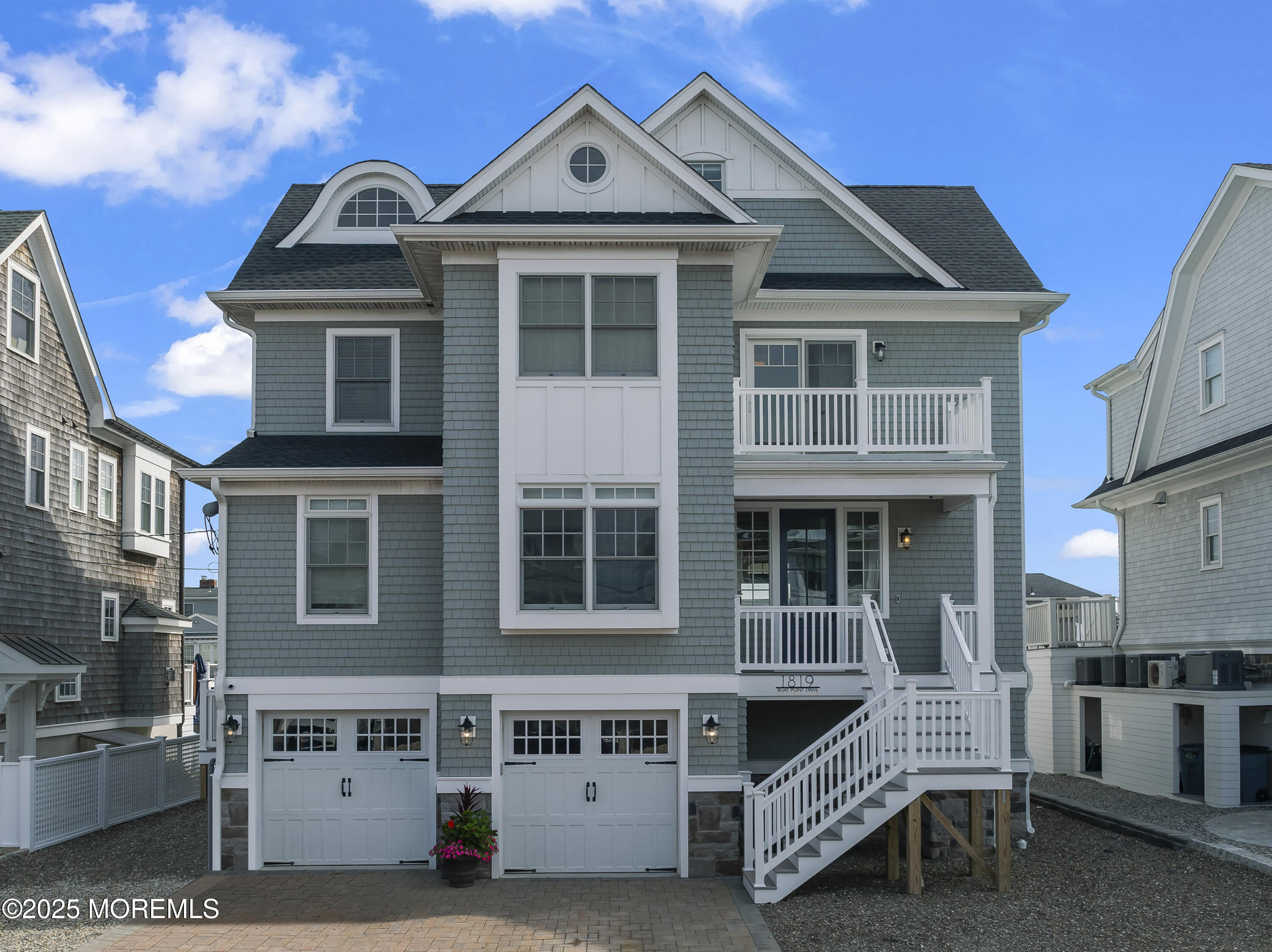a front view of a building with many windows