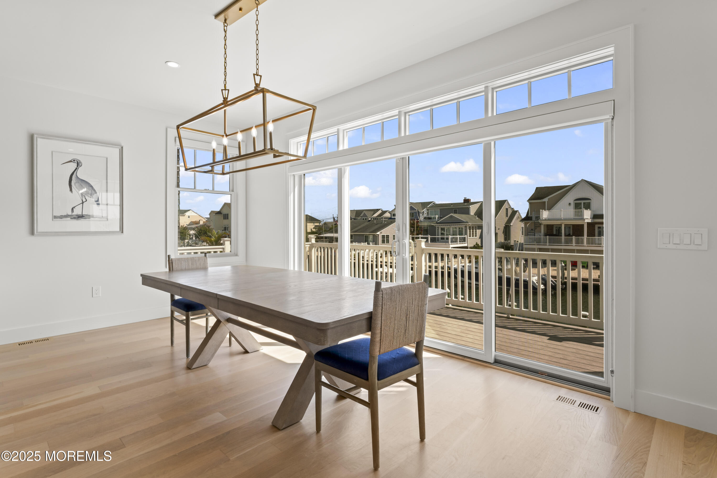 1819 Boat Point Drive Point Pleasant, NJ 08742 - Photo 14 of 48 a view of a dining room with furniture window and wooden floor