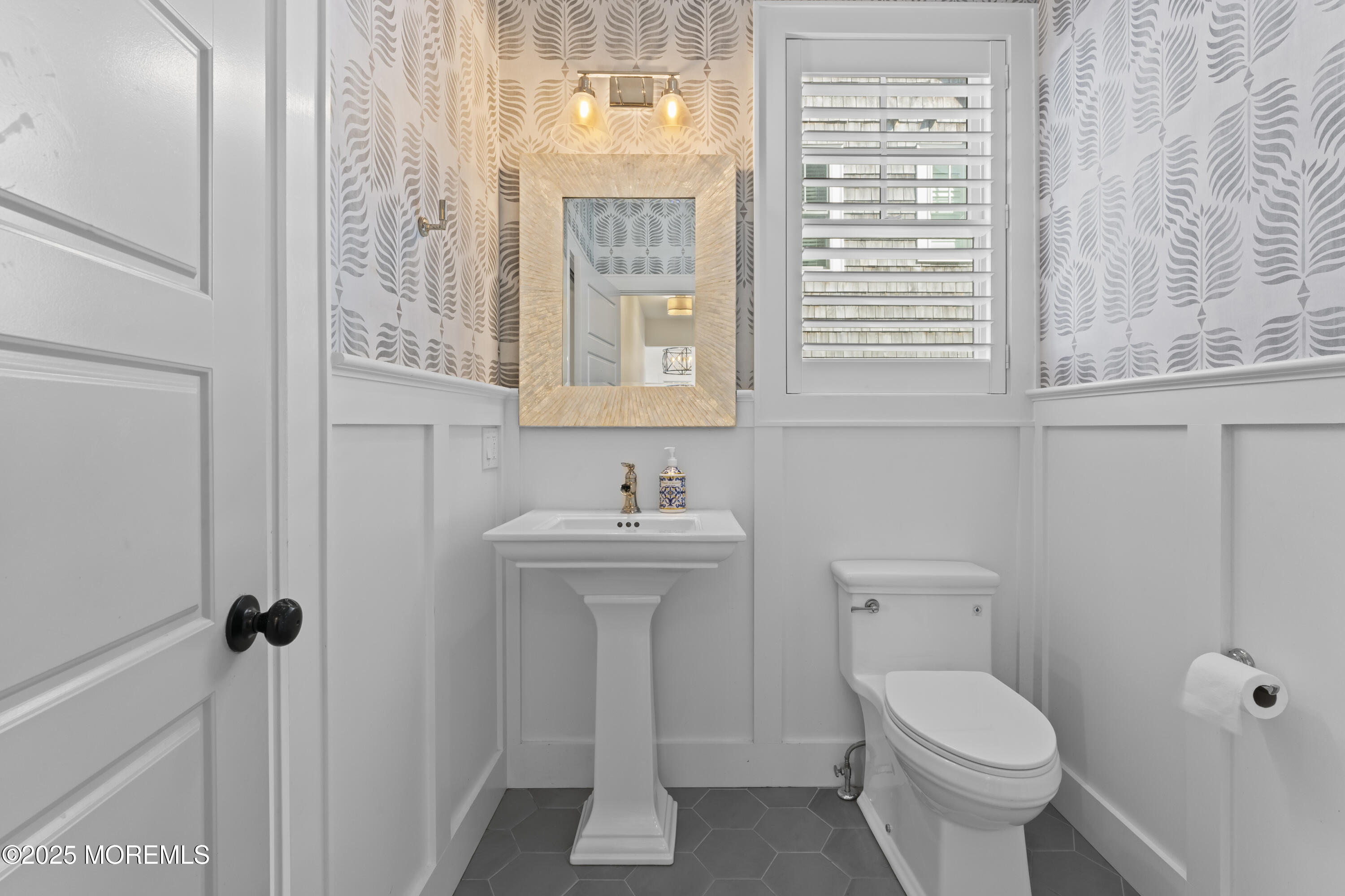 1819 Boat Point Drive Point Pleasant, NJ 08742 - Photo 18 of 48 a bathroom with a toilet a sink and a window