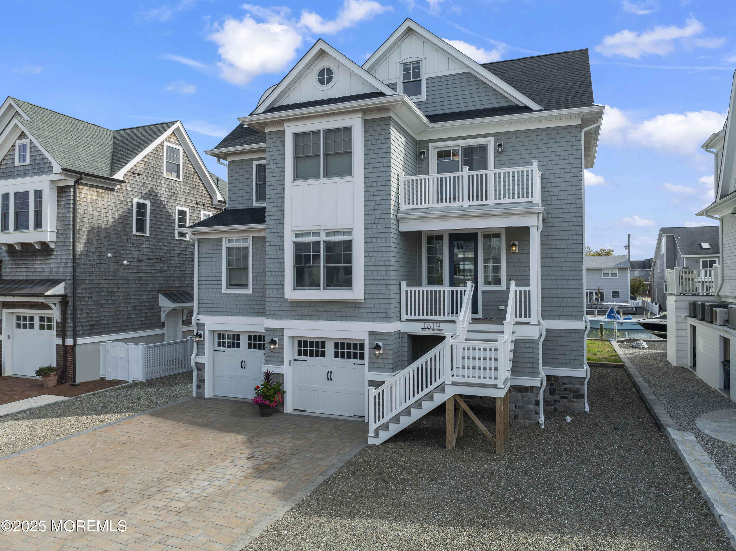 1819 Boat Point Drive Point Pleasant, NJ 08742 - Photo 2 of 48 a front view of a house with a porch