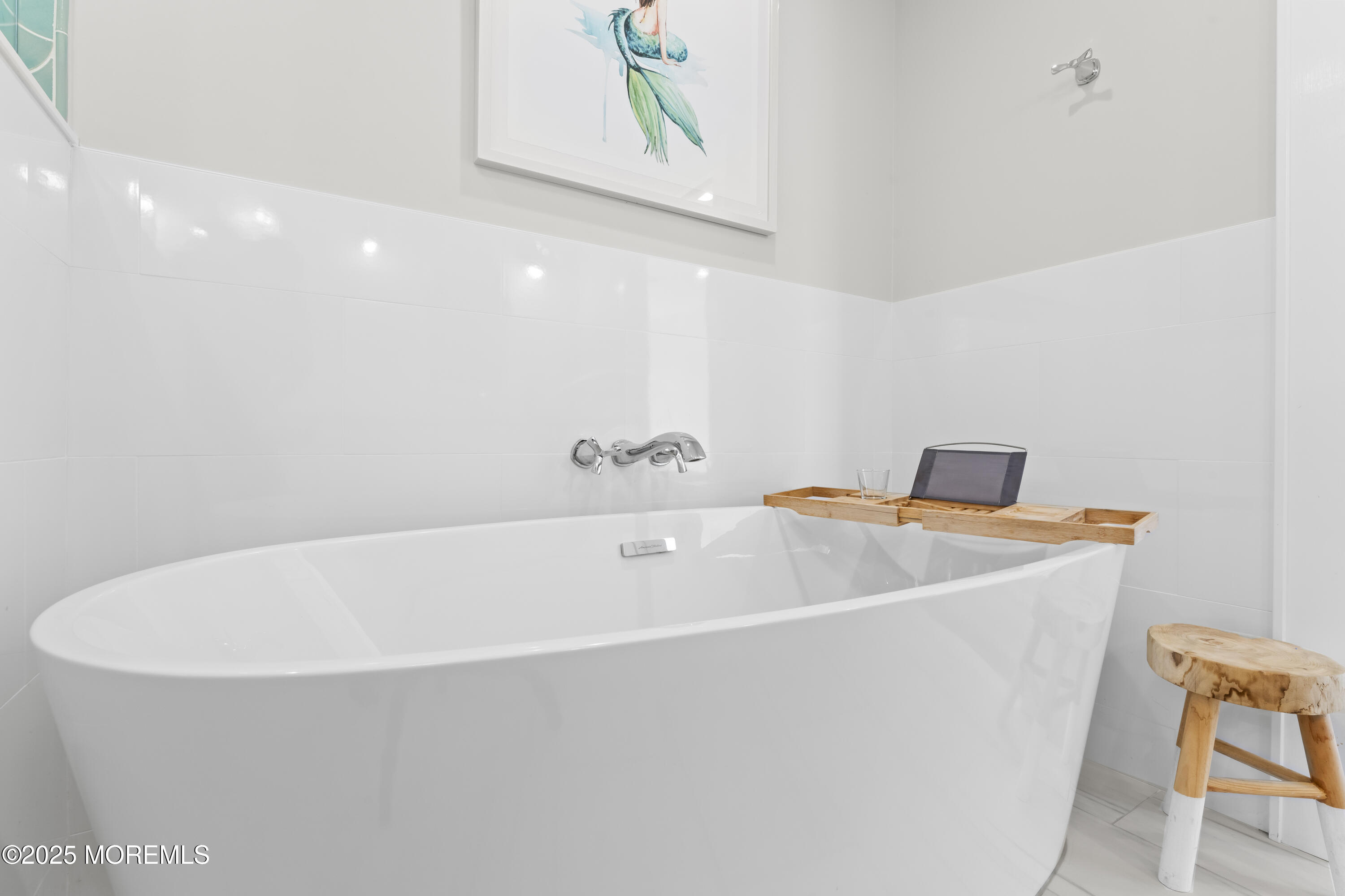 1819 Boat Point Drive Point Pleasant, NJ 08742 - Photo 24 of 48 a white bath tub sitting in a bathroom