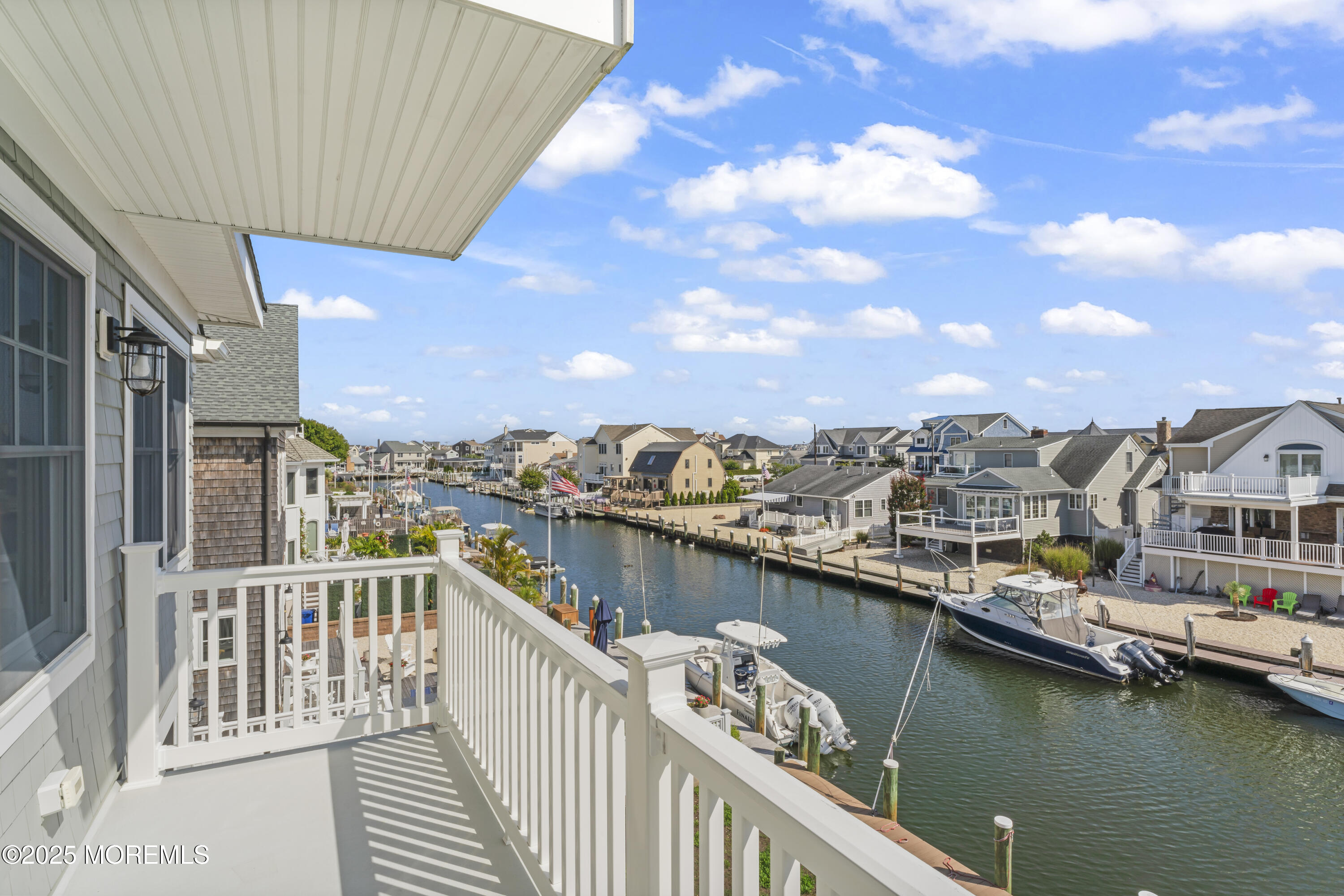 1819 Boat Point Drive Point Pleasant, NJ 08742 - Photo 26 of 48 a view of a lake from a balcony