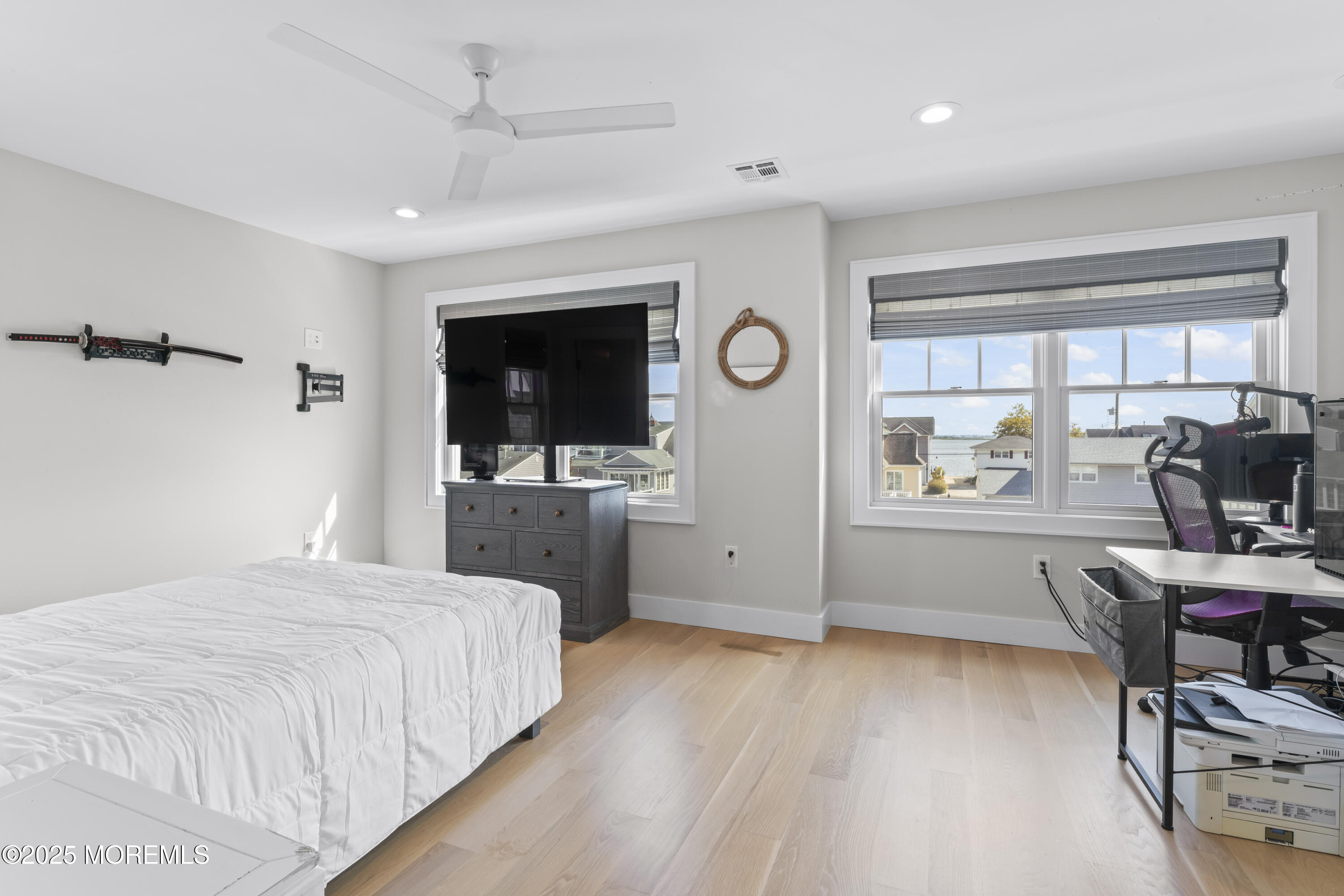 1819 Boat Point Drive Point Pleasant, NJ 08742 - Photo 30 of 48 a bedroom with a bed and a flat screen tv