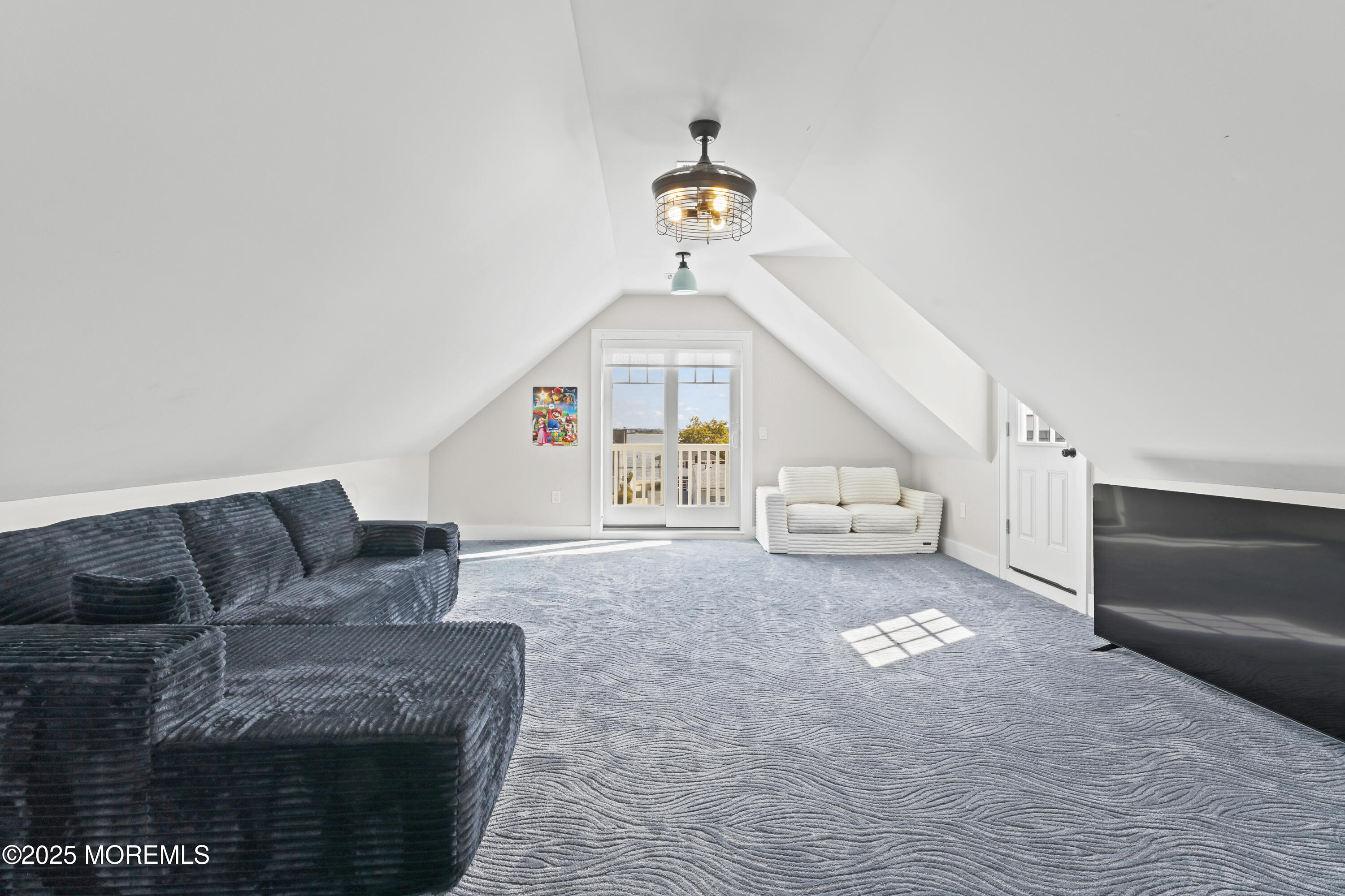 1819 Boat Point Drive Point Pleasant, NJ 08742 - Photo 35 of 48 a living room with furniture and a chandelier