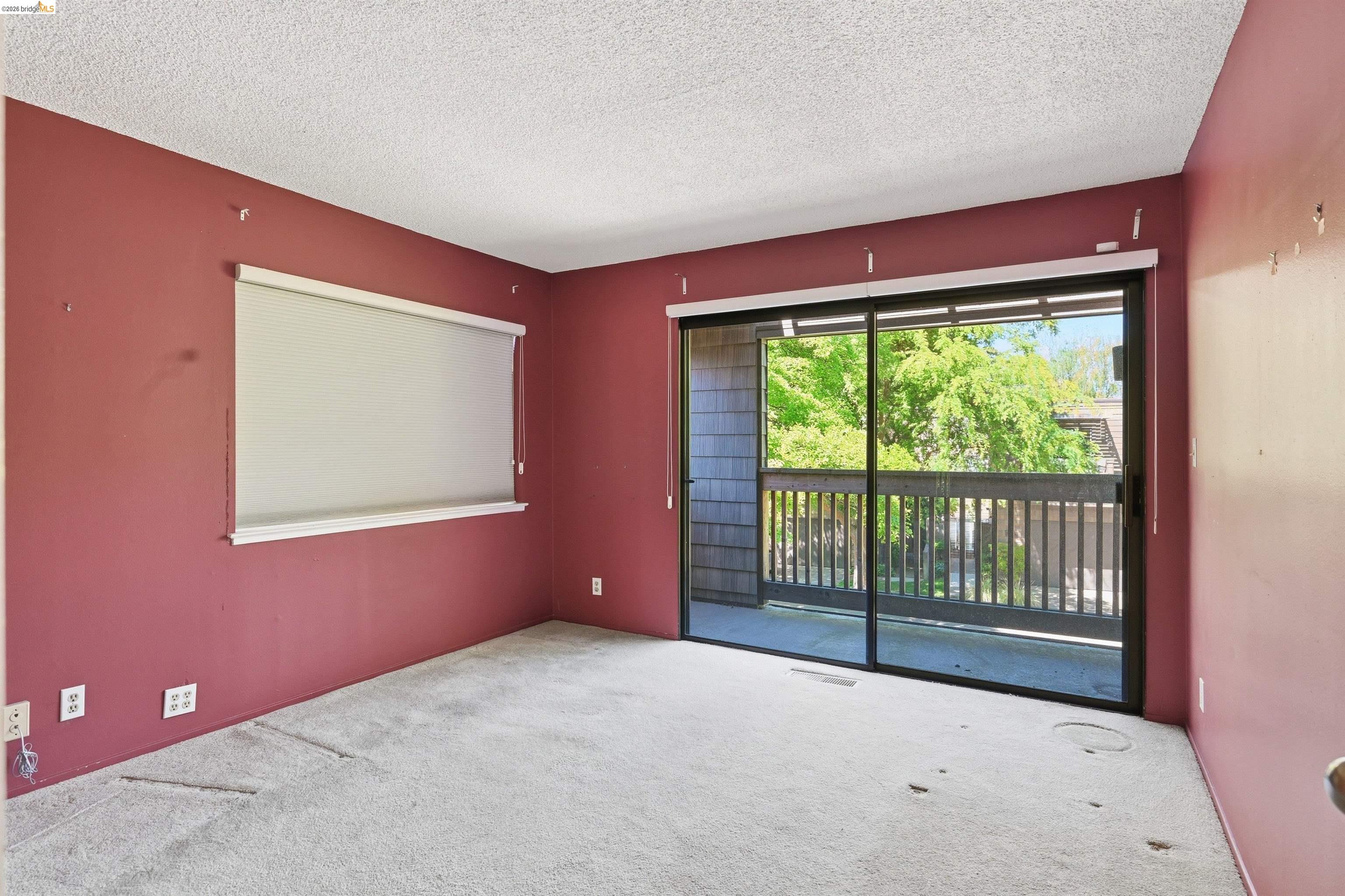 1925 Piper Ridge Court Walnut Creek, CA 94597 - Photo 17 of 27 Carpeted spare room featuring a textured ceiling