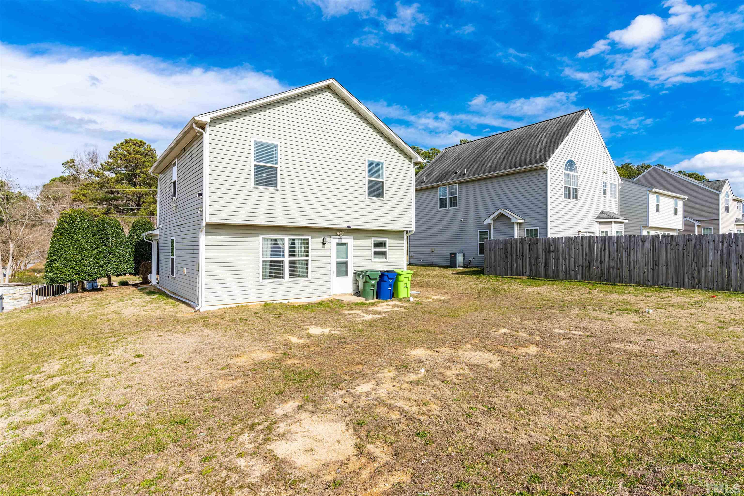3902 Evans Drive Raleigh, NC 27610 - Photo 5 of 31 a view of a house with a yard
