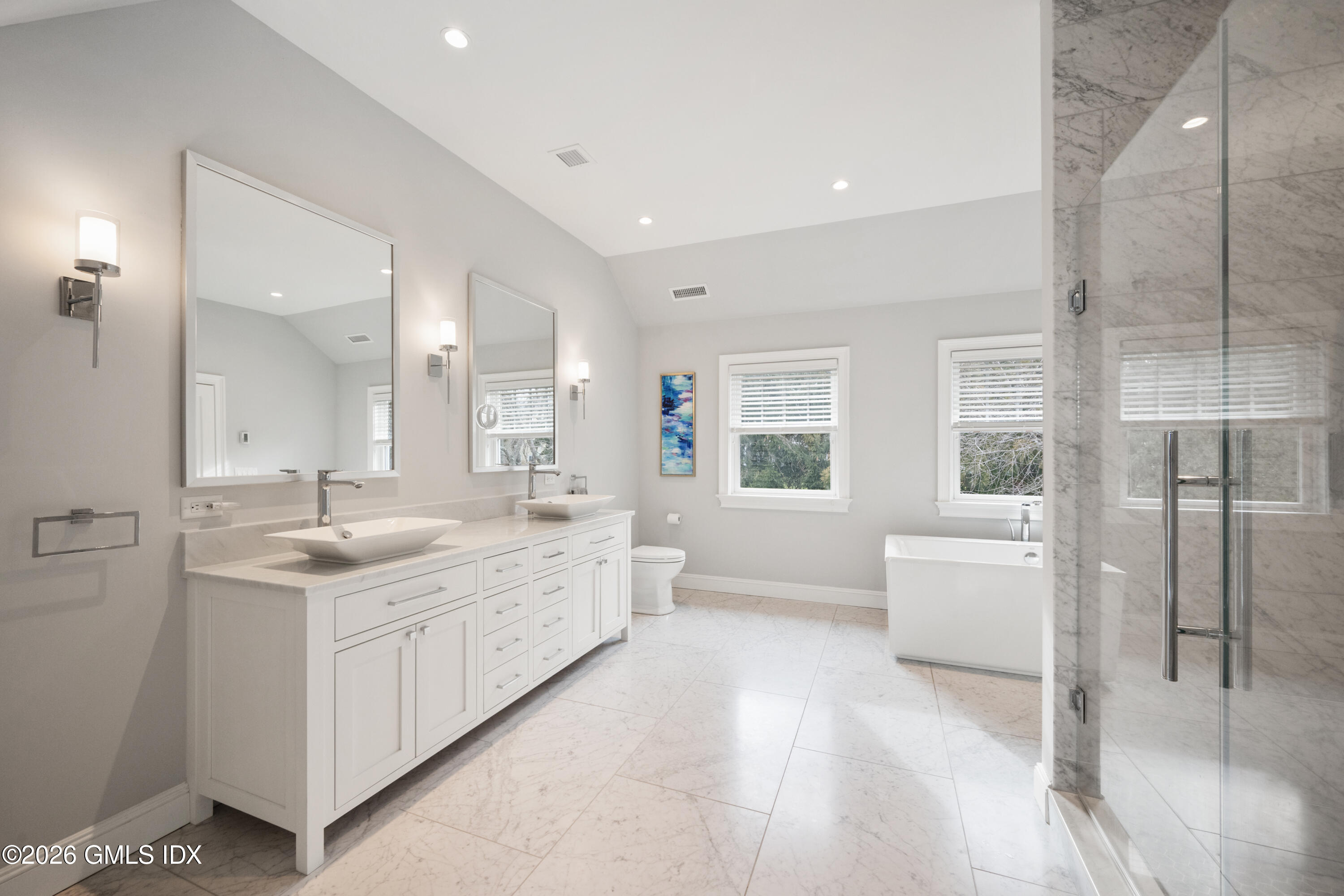 15 Pell Place Riverside, CT 06878 - Photo 18 of 35 a bathroom with a granite countertop sink mirror and bathtub
