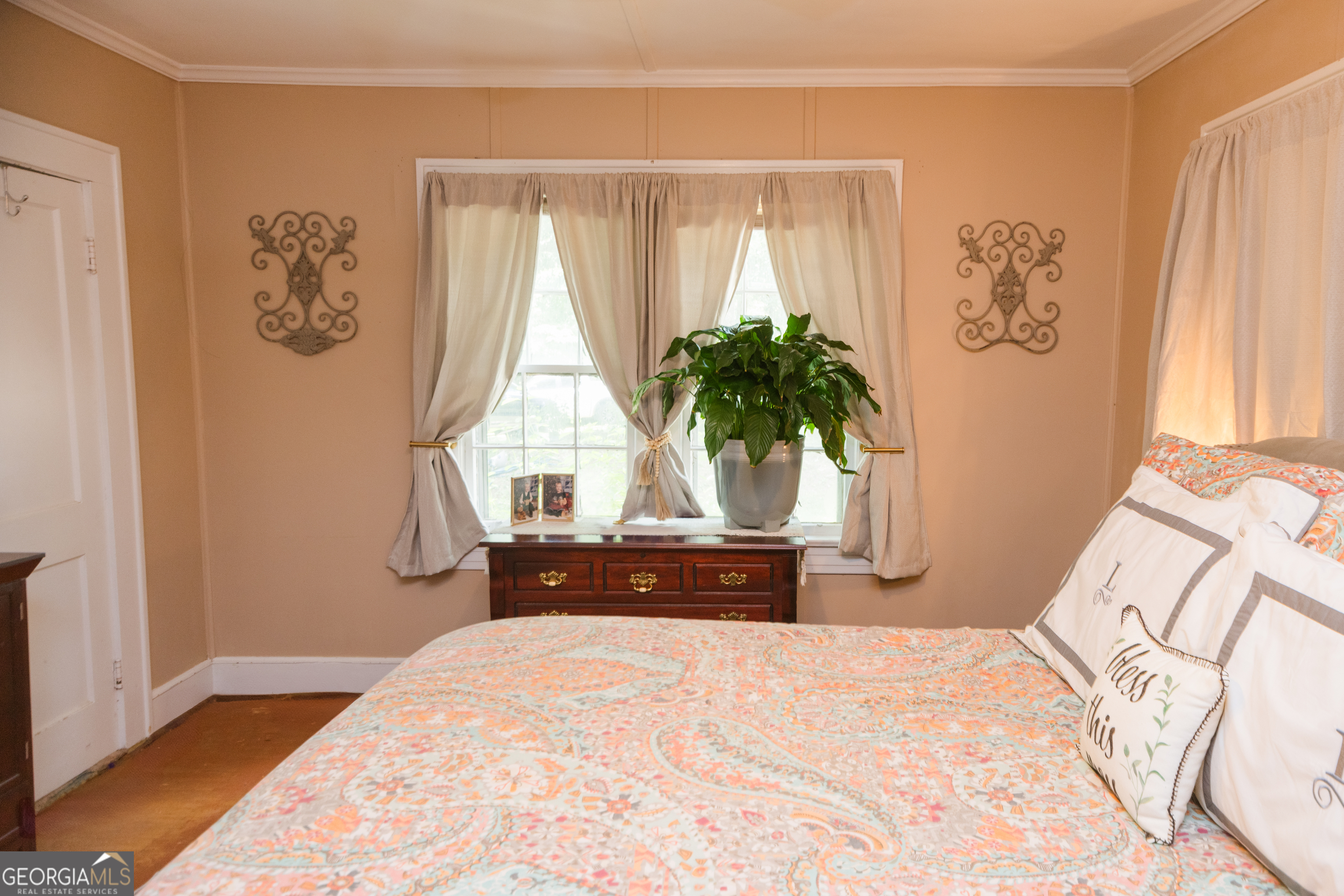 348 Americus Highway Butler, GA 31006 - Photo 35 of 59 a bedroom with a bed and a window