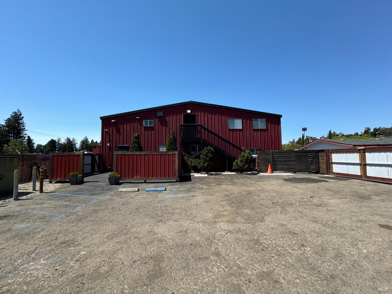 3753 Santa Rosa Avenue, Unit B Santa Rosa, CA 95407 - Photo 12 of 34 a view of a house with a yard and wooden fence
