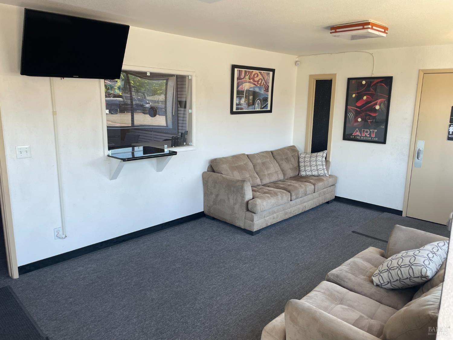 3753 Santa Rosa Avenue, Unit B Santa Rosa, CA 95407 - Photo 14 of 34 a living room with furniture and a flat screen tv