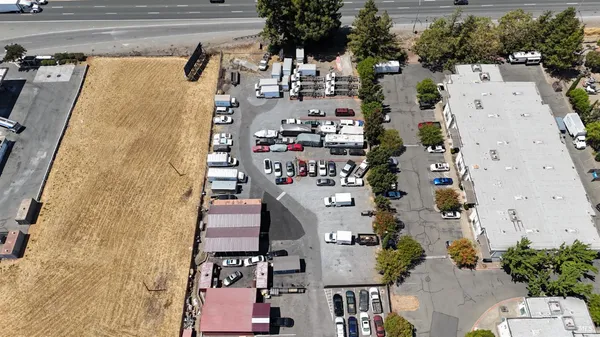 an aerial view of houses with outdoor space