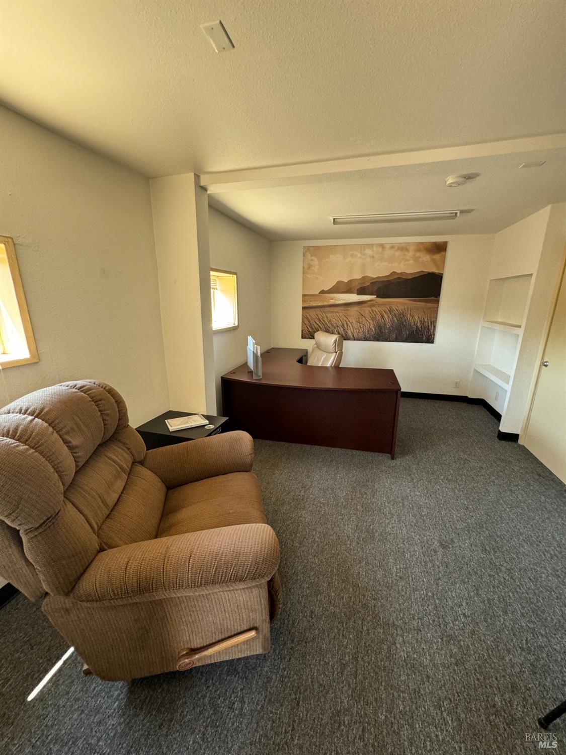 3753 Santa Rosa Avenue, Unit B Santa Rosa, CA 95407 - Photo 27 of 34 a living room with furniture and a window