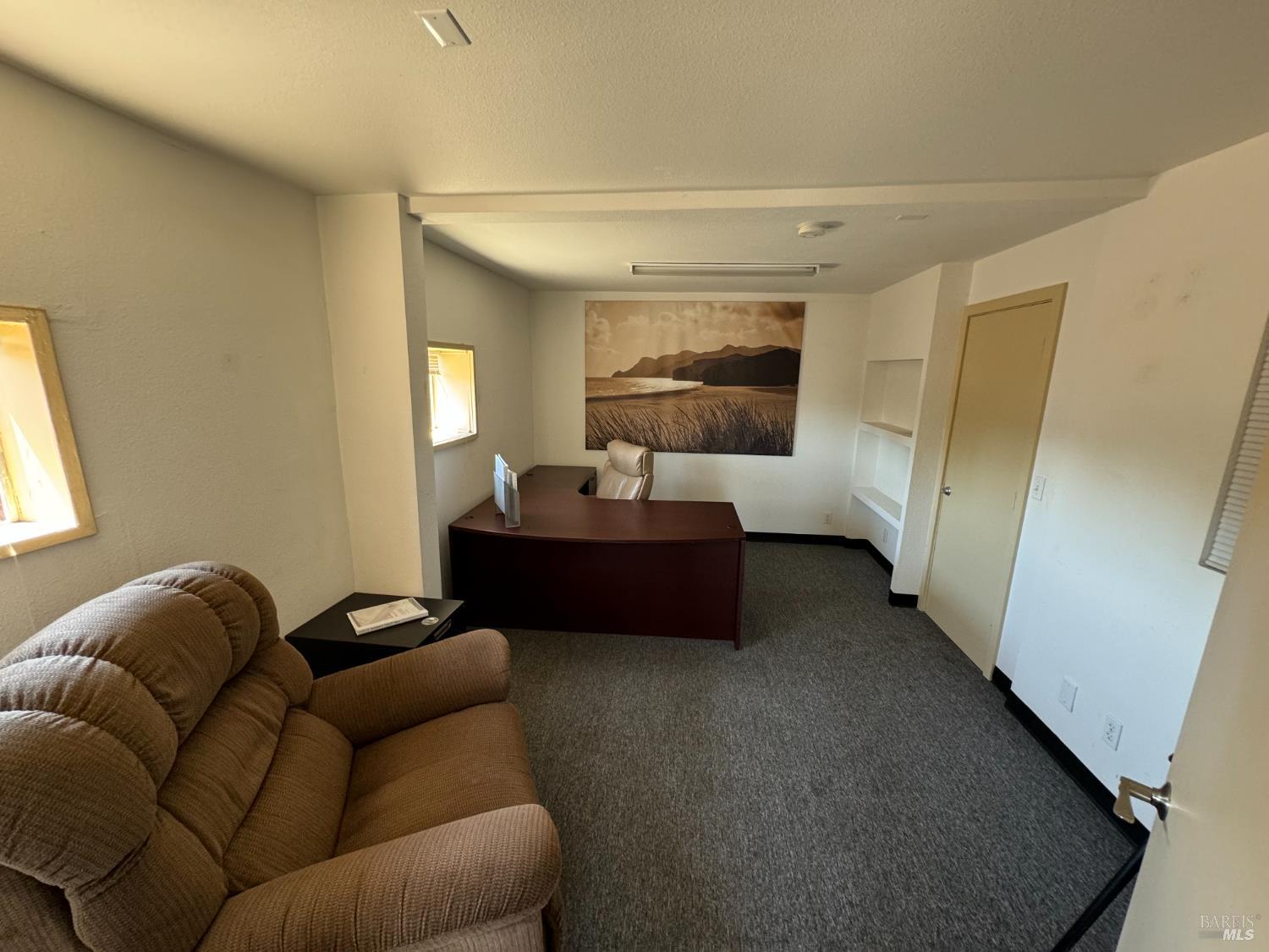 3753 Santa Rosa Avenue, Unit B Santa Rosa, CA 95407 - Photo 28 of 34 a living room with furniture and a window