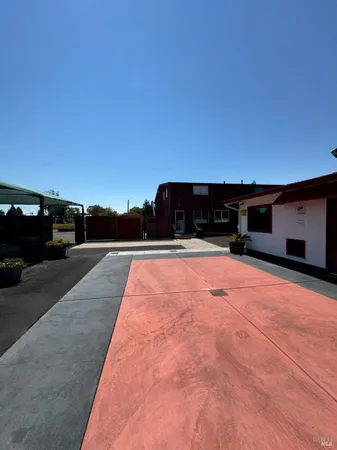 a view of swimming pool with a yard