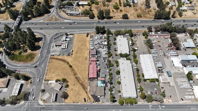 an aerial view of a highlighted house