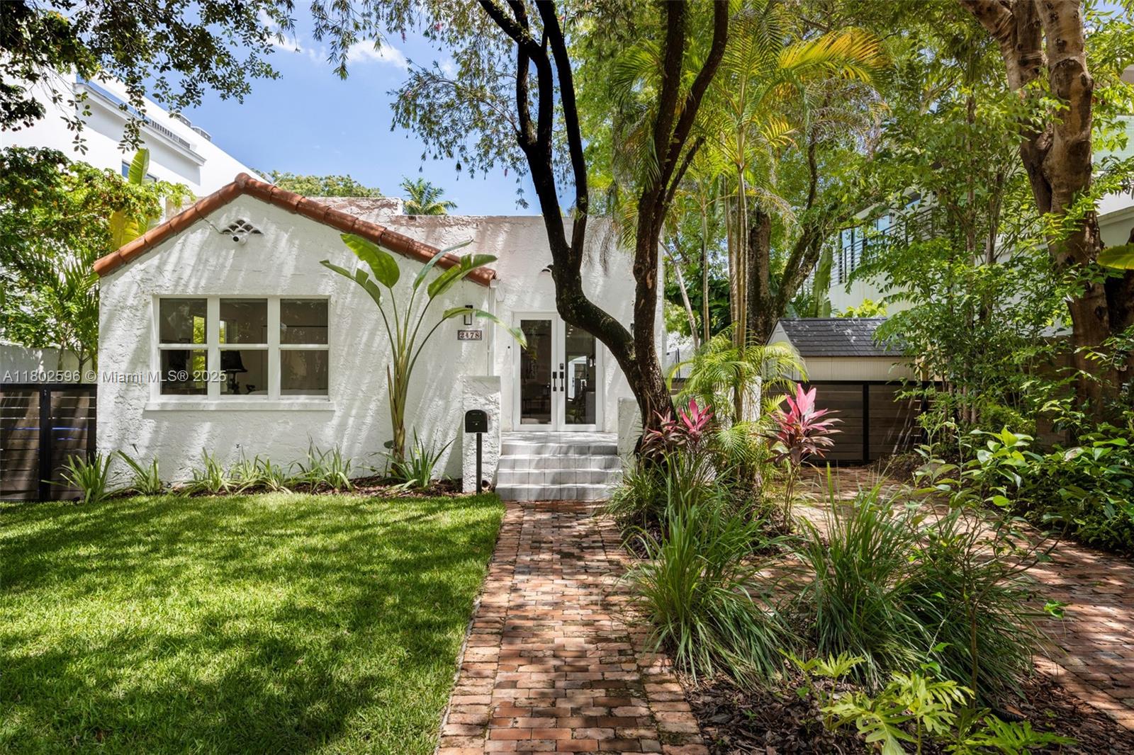 a view of a house with garden