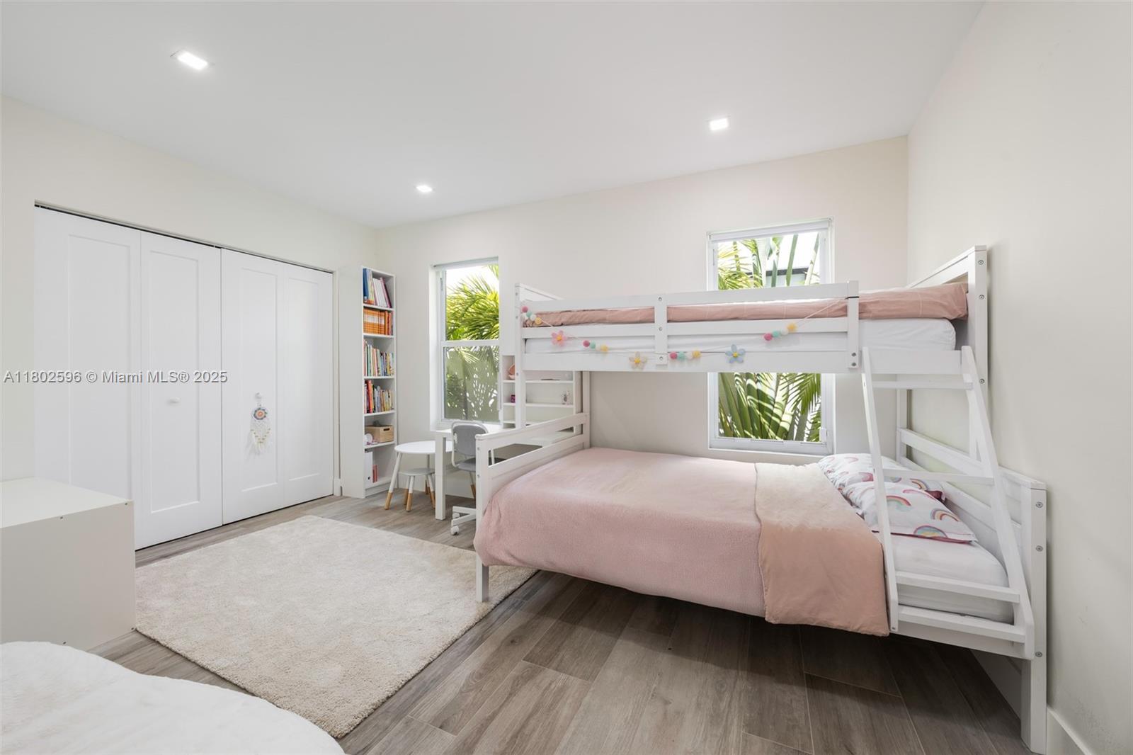 2478 Inagua Avenue Coconut Grove, FL 33133 - Photo 18 of 40 a bedroom with a bed and a night stand