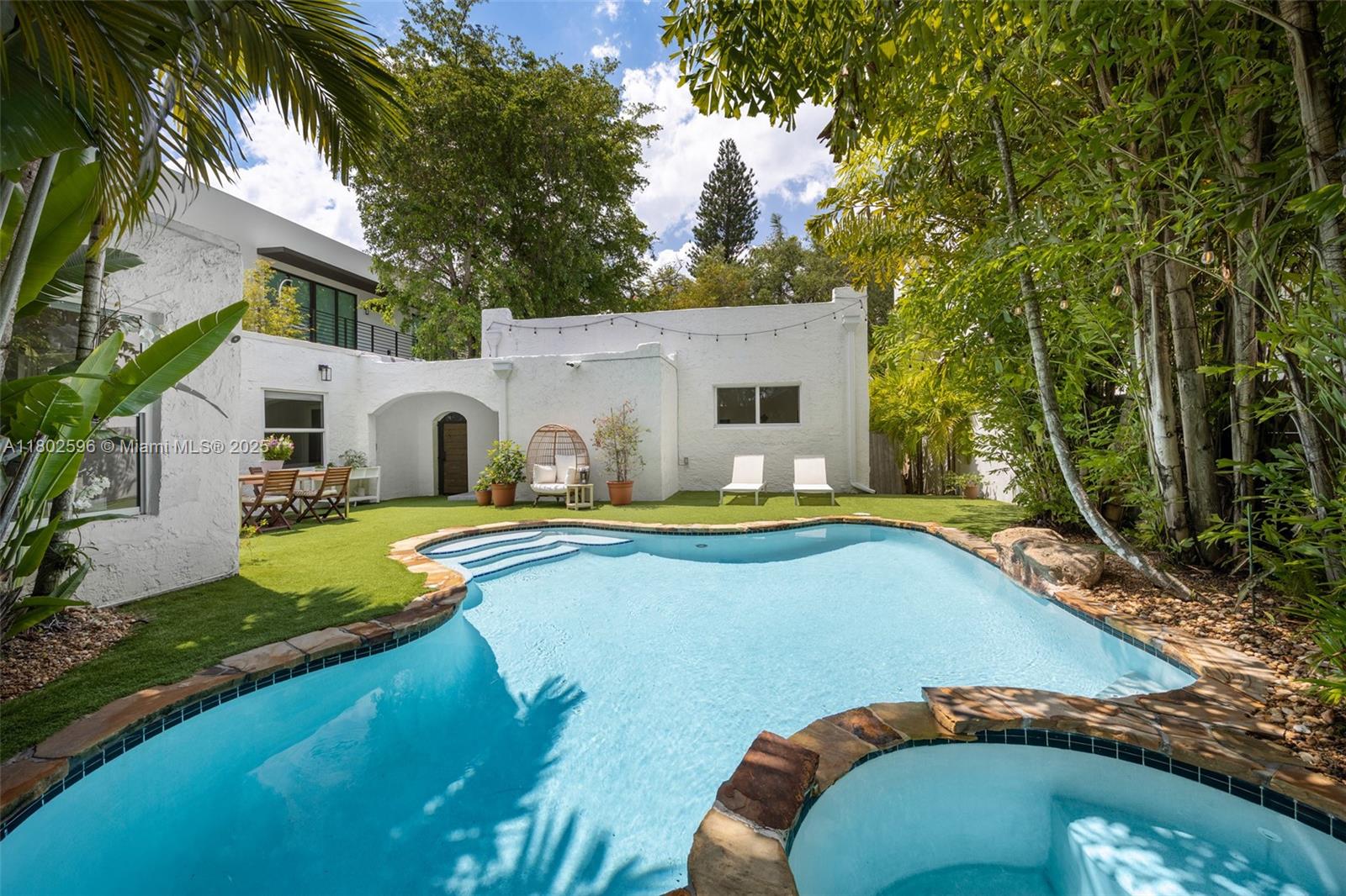 2478 Inagua Avenue Coconut Grove, FL 33133 - Photo 32 of 40 a view of swimming pool with backyard
